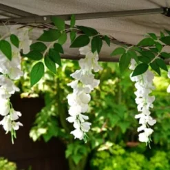 Solar Powered 180cm Artificial Leaf Garland With Wisteria Flowers - Warm White -Cheap A Fresh Garden Store 379258 180cm solar powered artificial leaf garland with wisteria flowers 20 warm white micro leds